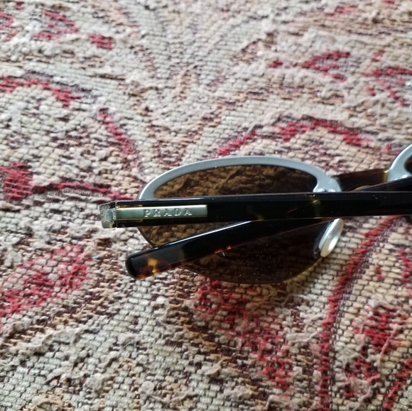 PRADA Sunglasses Model:PRADA SPR 10B Frame Color:Brushed Matte Silver Tortoise - Picture 12 of 13